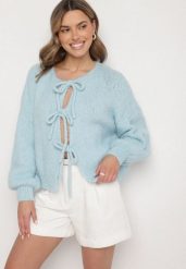 Niebieski Kardigan Oversize z Wełną Zdobiony Kokardkami Eleathalie. Niebieskie kardigany damskie Born2be, z aplikacjami, z wełny. Za 129.99 zł.