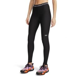 Legginsy fitness damskie Under Armour HeatGear. Czarne legginsy sportowe damskie Under Armour, l, bez wzorów, z materiału, na fitness i siłownię. Za 199.99 zł.