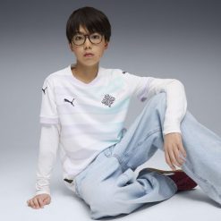 Młodzieżowa koszulka wyjazdowa reprezentacji Islandii kobiet 2025 PUMA. Biała koszulki damskie Puma, m, bez wzorów, bez kołnierzyka, bez ramiączek. Za 329.00 zł.