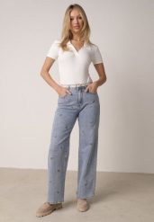 Niebieskie Jeansy z Bawełną o Szerokim Kroju z Wysokim Stanem Ozdobione Haftem Oslian. Niebieskie jeansy damskie Born2be, z podwyższonym stanem. Za 129.99 zł.