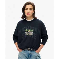 Sweter pamiątkowy podróżny luzem. Niebieskie koszulki sportowe damskie Superdry, bez wzorów, z bawełny, bez ramiączek. W wyprzedaży za 257.65 zł.