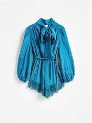 Kombinezon z wiskozą - turkusowy. Niebieskie kombinezony damskie Reserved, l, bez wzorów, z tkaniny, bez kołnierzyka, bez ramiączek. Za 259.99 zł.