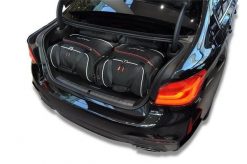 Torby Do Bagażnika Bmw 5 Limousine Phev 2020-2023 4Szt Kjust. Czarne torby podróżne KJUST, bez wzorów, z kauczuku. Za 1,213.00 zł.