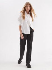Calvin Klein Spodnie materiałowe Essential K20K206879 Czarny Slim Fit. Czarne spodnie materiałowe damskie Calvin Klein, bez wzorów, z materiału. Za 479.99 zł.