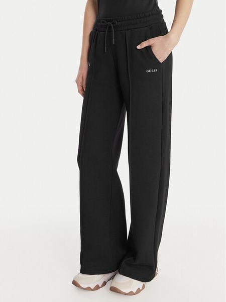 Guess Spodnie dresowe V6RB17 K9V31 Czarny Regular Fit. Czarne spodnie dresowe damskie Guess, l, z aplikacjami, z bawełny. Za 349.99 zł.