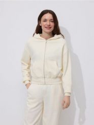 Rozpinana bluza - kremowy. Białe bluzy damskie Reserved, l, bez wzorów, z bawełny, bez kaptura. Za 109.99 zł.