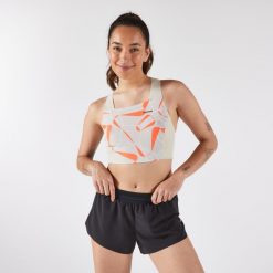 Koszulka do biegania bez rękawów damska Kiprun Race 900 Light crop top. Brązowe koszulki damskie KIPRUN, m, bez wzorów, z elastanu, bez kołnierzyka, bez ramiączek. Za 129.99 zł.