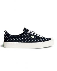 Tenisówki Cariuma OCA Low Polka Dot Black Canvas. Czarne trampki damskie CARIUMA, bez wzorów, z gumy, bez zapięcia. Za 233.70 zł.