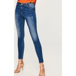 Jeansy o dopasowanym fasonie - Granatowy. Niebieskie jeansy damskie Reserved. Za 99.99 zł.