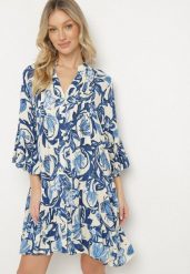 Niebieska Sukienka o Rozkloszowanym Kroju z Falbanami w Kwiatowy Wzór Ridivanna. Niebieskie sukienki damskie Born2be, bez wzorów, eleganckie, bez ramiączek. Za 159.99 zł.