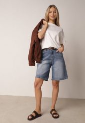 Niebieskie Bawełniane Szorty Jeansowe Bermudy z Wysokim Stanem Avariel. Niebieskie szorty damskie Born2be, bez wzorów, z bawełny, z podwyższonym stanem. Za 89.99 zł.