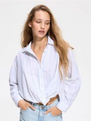 Koszula w paski z lnem - jasnoniebieski. Niebieskie koszule damskie Reserved, l, bez wzorów, z bawełny, bez kołnierzyka, bez ramiączek. Za 129.99 zł.