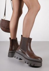 Brązowe Casualowe Botki Typu Sztyblety na Tłoczonej Platformie Riadira. Brązowe botki damskie Renee, z jeansu, eleganckie, bez obcasa, na platformie, bez zapięcia. Za 169.99 zł.