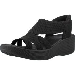 Sandały SKECHERS 120012S Czarny. Czarne sandały damskie Skechers, bez wzorów, z materiału, bez obcasa, bez zapięcia. Za 233.99 zł.