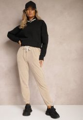 Ciemnobeżowe Dresowe Spodnie z Bawełną High Waist Wykończone w Pasie Gumką Ekadela. Brązowe spodnie dresowe damskie Renee, l, bez wzorów, z bawełny. Za 49.99 zł.