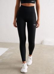 Damskie legginsy z wysokim stanem, squat proof, z tylną kieszenią Core czarne. Czarne legginsy damskie Aim'n, s, bez wzorów, z elastanu, z podwyższonym stanem, do biegania. Za 296.00 zł.