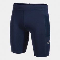 Legginsy Joma Elite X niebieskie do biegania. Niebieskie legginsy damskie Joma, bez wzorów, z poliamidu. W wyprzedaży za 147.75 zł.