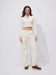 Bluza z wysoką stójką - jasnożółty. Żółte bluzy damskie Reserved, l, bez wzorów, z bawełny, bez kaptura. Za 89.99 zł.