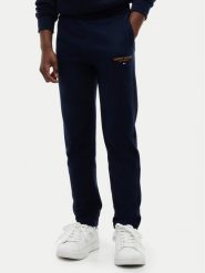 Tommy Hilfiger Spodnie dresowe Essential KB0KB10772 Granatowy Regular Fit. Niebieskie spodnie dresowe chłopięce Tommy Hilfiger, z bawełny. Za 249.99 zł.