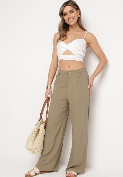 Ciemnozielone Spodnie z Wiskozy i Lnu z Wysokim Stanem i Szerokimi Nogawkami Aidrons. Zielone spodnie materiałowe damskie Born2be, bez wzorów, z jeansu. Za 79.99 zł.