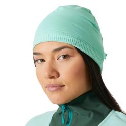 Czapka Helly Hansen Versalite. Niebieskie czapki damskie Helly Hansen, bez wzorów, z elastanu. Za 160.00 zł.
