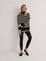 Legginsy z gorsetowym stanem - czarny. Czarne legginsy damskie Reserved, l, bez wzorów, z dzianiny. W wyprzedaży za 39.99 zł.