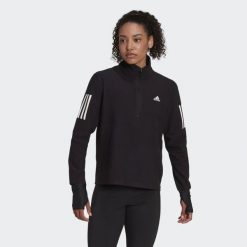 Bluza do biegania Own the Run Running 1/2 Zip. Czarne bluzy damskie Adidas, xs, bez wzorów, z materiału, bez kaptura. W wyprzedaży za 202.25 zł.