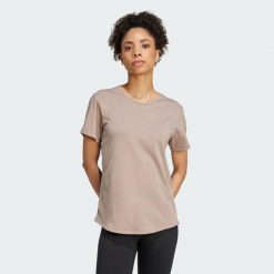 Koszulka Joga Essentials. Brązowe bluzki damskie Adidas, s, bez wzorów, bez kołnierzyka, bez ramiączek. Za 149.00 zł.