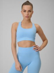 4F Biustonosz treningowy bezszwowy z niskim wsparciem damski - niebieski XL/XXL. Niebieskie biustonosze sportowe damskie 4F, bez wzorów, z materiału. Za 89.99 zł.