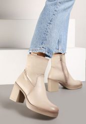 Beżowe Botki na Słupku z Ozdobnymi Przeszyciami Siathra. Brązowe botki damskie Renee, z dzianiny, eleganckie, bez obcasa, na obcasie, bez zapięcia. Za 179.99 zł.
