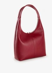 Torebka z imitacji skóry. Czarne torebki klasyczne damskie bonprix, ze skóry, bez dodatków. Za 134.99 zł.