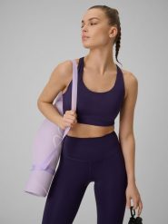 4F Biustonosz treningowy ze średnim wsparciem damski - fioletowy L. Fioletowe biustonosze sportowe damskie 4F, bez wzorów, z gumy. Za 179.99 zł.