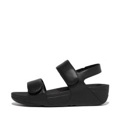 Damskie sandały z regulowanym skórzanym paskiem z tyłu FitFlop Lulu. Czarne sandały damskie FIT FLOP, bez wzorów, z materiału, bez obcasa, bez zapięcia. Za 534.50 zł.