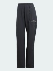 Adidas Spodnie przeciwdeszczowe w kolorze czarnym rozmiar: 40. Czarne spodnie dresowe damskie Adidas, bez wzorów, outdoorowe. Za 176.08 zł.