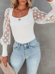 Milan Kiss Koszulka w kolorze kremowym rozmiar: M. Brązowe bluzki damskie Milan Kiss, m, bez wzorów, bez kołnierzyka, bez ramiączek. Za 156.98 zł.