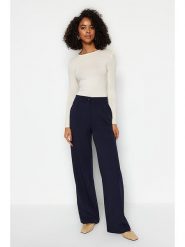 Trendyol Spodnie w kolorze granatowym rozmiar: 34. Niebieskie spodnie materiałowe damskie Trendyol, bez wzorów, z materiału. Za 65.99 zł.