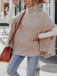 Milan Kiss Ponczo w kolorze beżowym rozmiar: L. Brązowe golfy damskie Milan Kiss, l, bez wzorów, z polaru, bez ramiączek. Za 178.37 zł.