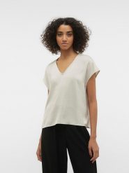 Vero Moda Koszulka w kolorze kremowym rozmiar: XS. Brązowe bluzki damskie Vero Moda, xs, bez wzorów, z poliamidu, bez kołnierzyka, bez ramiączek. Za 39.49 zł.