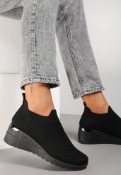 Czarne Buty Sportowe Mellasia. Czarne obuwie sportowe casual damskie Renee. Za 49.99 zł.