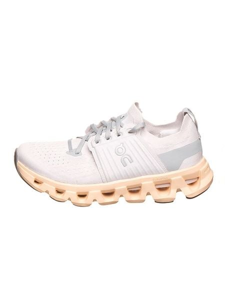 ON RUNNING Buty "Cloudswift 4" w kolorze biało-brzoskwiniowym do biegania rozmiar: 39. Białe obuwie sportowe damskie On Running, bez zapięcia, do biegania. Za 613.51 zł.