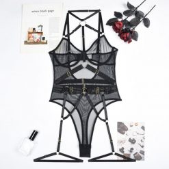 Body z kontrastowymi paseczkami na co dzień i okazje Roxine. Czarne body i gorsety Intica, bez wzorów. Za 129.00 zł.