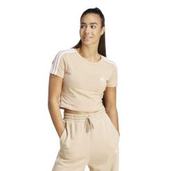 Koszulka damska ADIDAS Gym & Pilates crop slim. Białe bluzki damskie Adidas, s, bez wzorów, z bawełny, bez kołnierzyka, bez ramiączek. W wyprzedaży za 99.99 zł.