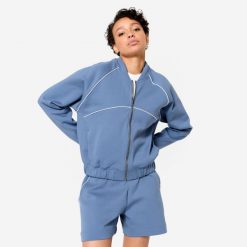 Bluza fitness bomberka damska Domyos. Niebieskie bluzy damskie DOMYOS, xl, bez wzorów, z bawełny, bez kaptura. W wyprzedaży za 119.99 zł.