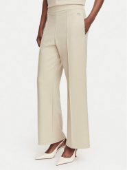 Calvin Klein Spodnie materiałowe LV044G210G Beżowy Wide Leg. Brązowe spodnie materiałowe damskie Calvin Klein, bez wzorów, z materiału. Za 359.99 zł.