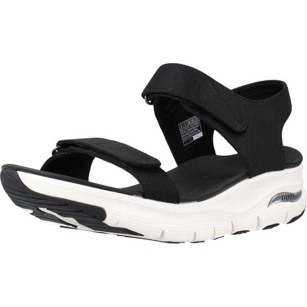 Buty Kobieta Skechers Arch Fit Touristy czarny. Czarne obuwie sportowe damskie Skechers, na lato, bez zapięcia. Za 249.99 zł.