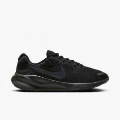 Tenisówki Nike Model Revolution 7 Kolor Czarny. Czarne trampki damskie Nike, bez wzorów, z materiału, bez zapięcia. Za 315.00 zł.