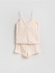 Dwuczęściowa piżama z bawełny - kremowy. Białe piżamy damskie Reserved, bez wzorów, z bawełny, bez ramiączek. Za 69.99 zł.