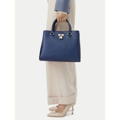 Torebka Nine West. Niebieskie kuferki damskie Nine West, bez wzorów, bez dodatków. Za 299.99 zł.