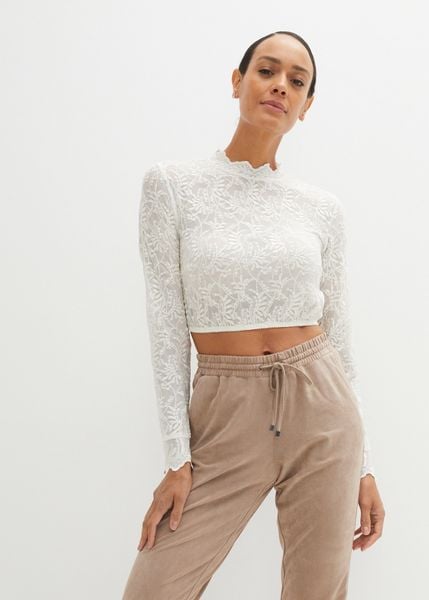 Krótka bluzka koronkowa w ludowym stylu, długi rękaw. Białe bluzki damskie bonprix, bez wzorów, z koronki, bez kołnierzyka, bez ramiączek. Za 189.99 zł.
