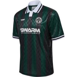 Koszulka Hummel Loose. Zielone koszulki damskie Hummel, bez wzorów, bez kołnierzyka, bez ramiączek. W wyprzedaży za 193.50 zł.